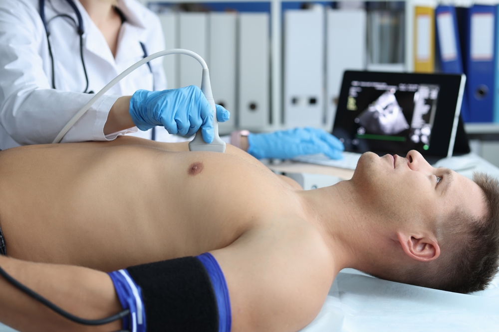 Echocardiogram test on patient lying down