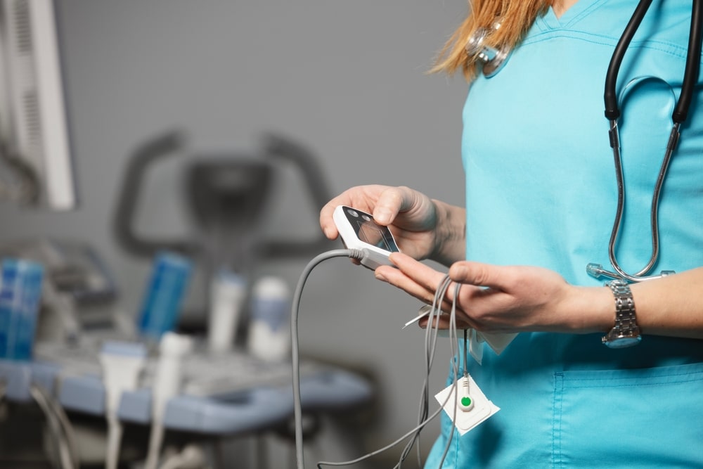 Electrocardiographic in doctor's hand
